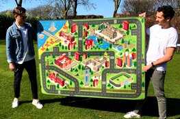Hoe vet is dát: een speelkleed van jouw favoriete stad Den Haag met o.a. het binnenhof, Scheveningen en het ADO Den Haag stadion!